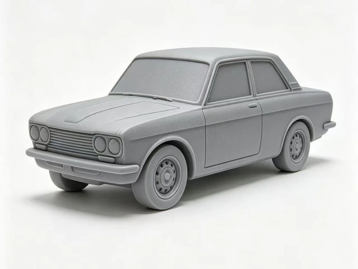 Grey SLA resin prototype of the toy sedan